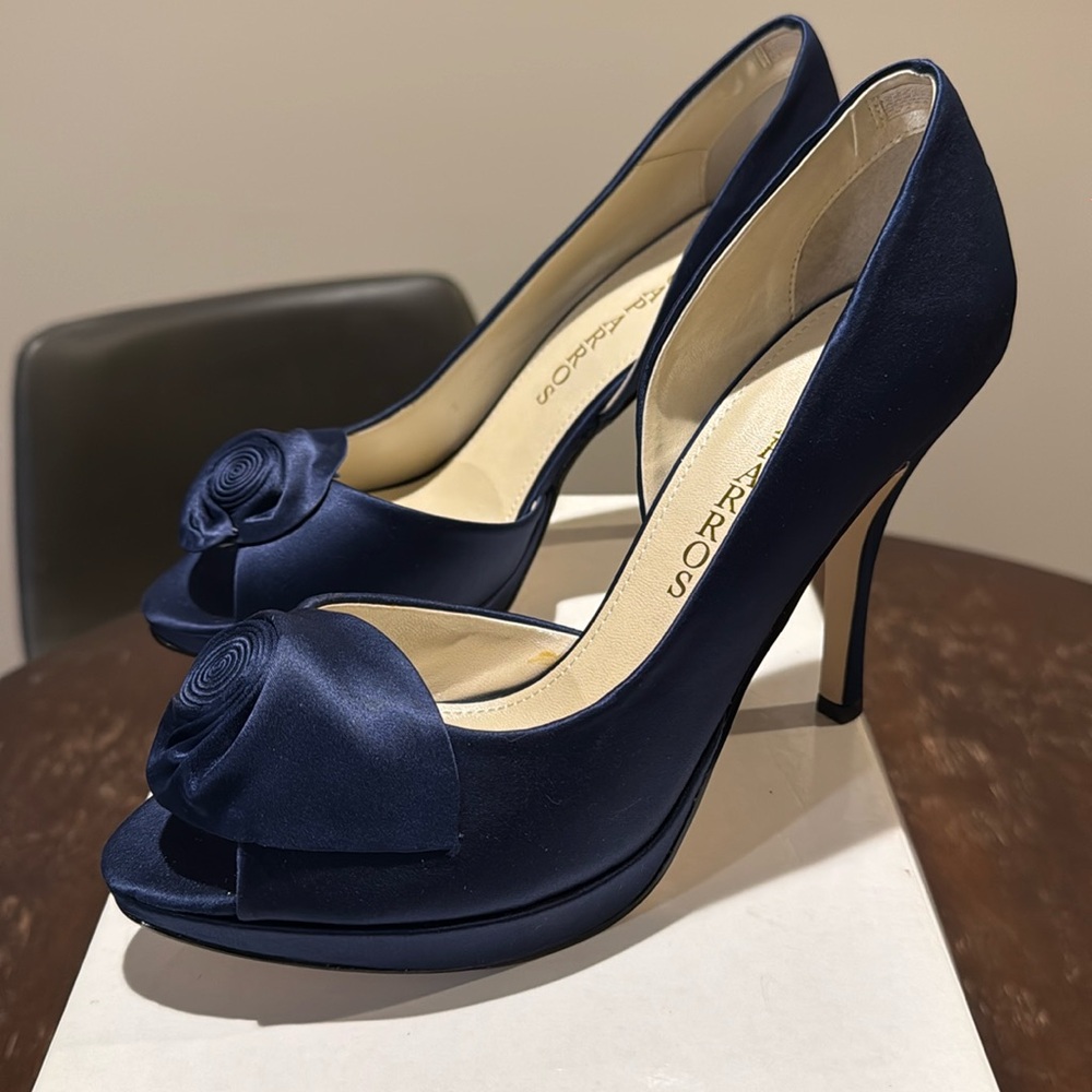 Caparros woman’s size 10 Navy Satin, new in box.